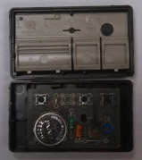 Liftmaster 3-Button transmitter opened showing battery
